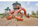 Colorful community playground with slides and climbing structures, perfect for active play at 11688 Brighton Knoll Loop, Riverview, FL 33579