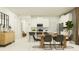 Bright open-concept living and kitchen area perfect for Gathering gatherings and entertaining guests at 11845 Sparkling Topaz Cv, Parrish, FL 34219