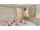 This bedroom features double closets, carpeted floors, and a neutral wall color scheme at 120 Cedarwood Cir # 120, Seminole, FL 33777