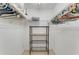 Bright walk-in closet featuring wire shelving and ample storage space for organization and convenience at 120 Cedarwood Cir # 120, Seminole, FL 33777