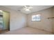 Bedroom with neutral tones, carpeted flooring, and natural light at 1242 Nelson St, Dunedin, FL 34698