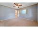 A large bedroom features neutral tones, carpet, and natural light at 1242 Nelson St, Dunedin, FL 34698