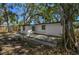 A portion of the home's backyard showing a concrete patio at 1247 21St St, Sarasota, FL 34234