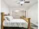 Bedroom featuring hardwood floors, a ceiling fan and lots of natural light at 1247 21St St, Sarasota, FL 34234