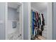 Bathroom and closet with gray and white color palette at 1278 Mission Cir # 45B, Clearwater, FL 33759