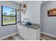 Bright dining area with charming details and a view to the outside at 1278 Mission Cir # 45B, Clearwater, FL 33759