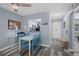 Cozy dining area with a kitchen pass-through and a view of the entryway at 1278 Mission Cir # 45B, Clearwater, FL 33759