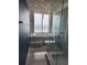 Bathroom with bathtub and step in shower with an ocean view at 1290 Gulf Blvd # 1701, Clearwater Beach, FL 33767