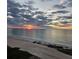 Panoramic beach view with vibrant colors during a beautiful sunset at 1290 Gulf Blvd # 1701, Clearwater Beach, FL 33767
