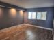 Bedroom with wood floors and large window for ample natural light at 1290 Gulf Blvd # 1701, Clearwater Beach, FL 33767