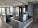 Open concept kitchen with a waterfall island, stainless steel appliances, and contemporary design at 1290 Gulf Blvd # 1701, Clearwater Beach, FL 33767