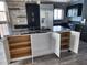 Modern kitchen features stainless steel appliances, island with granite countertops and plenty of cabinet storage at 1290 Gulf Blvd # 1701, Clearwater Beach, FL 33767