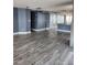 Hardwood floors throughout the living area leading to windows with lots of natural light and neutral paint at 1290 Gulf Blvd # 1701, Clearwater Beach, FL 33767