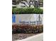 Community sign reading Lighthouse Towers with manicured landscaping in a well-maintained neighborhood at 1290 Gulf Blvd # 1701, Clearwater Beach, FL 33767