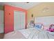 Bedroom with closet and dresser providing ample storage at 12935 Solola Way, Trinity, FL 34655