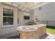 Outdoor Kitchen area featuring a built-in grill and countertop space, great for entertaining at 12935 Solola Way, Trinity, FL 34655