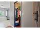 Walk-in closet and ensuite bathroom with a soaking tub and shower at 12935 Solola Way, Trinity, FL 34655