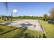 Outdoor basketball court with well-maintained surface and recreational amenities for community enjoyment at 13742 Artesa Bell Dr, Riverview, FL 33579