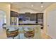 Bright kitchen with granite counters, stainless appliances and breakfast bar at 13742 Artesa Bell Dr, Riverview, FL 33579