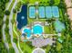 Stunning aerial shot showcasing the community pool, tennis courts, and surrounding greenery at 14537 Mirabelle Vista Cir, Tampa, FL 33626
