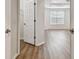 Spacious bedroom with tray ceiling, ceiling fan, and a large window at 14537 Mirabelle Vista Cir, Tampa, FL 33626