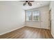 Bedroom showcasing two windows with wood-look flooring, and natural light at 14537 Mirabelle Vista Cir, Tampa, FL 33626