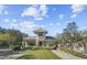 Beautiful community entrance with landscaped grounds and architectural design at 14537 Mirabelle Vista Cir, Tampa, FL 33626