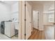 Laundry room with washer, dryer, and utility sink at 14537 Mirabelle Vista Cir, Tampa, FL 33626