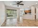 Open concept living area with sliding glass doors to the backyard at 14537 Mirabelle Vista Cir, Tampa, FL 33626