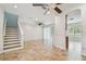 Spacious living area with tile floors, recessed lighting, and easy access to the kitchen and outdoor areas at 14537 Mirabelle Vista Cir, Tampa, FL 33626