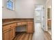 Office space includes a built-in desk with wood cabinets and drawers at 14537 Mirabelle Vista Cir, Tampa, FL 33626