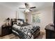Cozy bedroom with a black and white color scheme and a large window at 1486 Mahogany Ln # 703, Palm Harbor, FL 34683