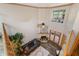 Bright living room with high ceilings, a fireplace, and access to the outdoors at 1486 Mahogany Ln # 703, Palm Harbor, FL 34683