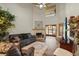 Spacious living room boasts soaring ceilings, fireplace, and comfortable seating at 1486 Mahogany Ln # 703, Palm Harbor, FL 34683