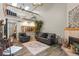 Cozy living room with fireplace, loft area, and comfortable seating arrangement at 1486 Mahogany Ln # 703, Palm Harbor, FL 34683