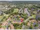 Bird's eye perspective showcasing the home, community, and surrounding golf course at 15 Tads Trl, Oldsmar, FL 34677