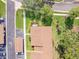 Aerial view highlighting the backyard patio, carport, and neighborhood layout at 15 Tads Trl, Oldsmar, FL 34677