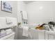 Bathroom featuring a walk-in tub with a tile surround and chrome fixtures at 15 Tads Trl, Oldsmar, FL 34677