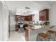 Bright kitchen boasts granite countertops, stainless appliances, and ample cabinet space at 15 Tads Trl, Oldsmar, FL 34677