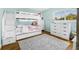 bedroom featuring a bunk bed, natural light, and ample storage space at 1501 84Th N Ave, St Petersburg, FL 33702