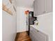 Hallway with utility storage and laundry access, providing convenience at 1501 84Th N Ave, St Petersburg, FL 33702