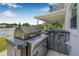 Lakeside outdoor kitchen with a premium grill for ultimate outdoor cooking experience at 1501 84Th N Ave, St Petersburg, FL 33702