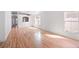 Bright living room features hardwood floors and natural light from large windows at 18106 Lembrecht Way, Tampa, FL 33647