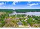Stunning lakefront property with lush landscaping and a spacious home near the water at 18929 Crescent Rd, Odessa, FL 33556