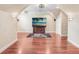 Spacious bonus room with a large television and unique ceiling features at 18929 Crescent Rd, Odessa, FL 33556