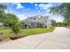 Beautiful home featuring a large screened-in lanai and well-maintained yard, offering a serene outdoor living space at 18929 Crescent Rd, Odessa, FL 33556