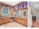 Updated kitchen featuring stainless steel appliances, wood cabinetry, and granite countertops at 18929 Crescent Rd, Odessa, FL 33556