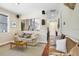 The living room boasts comfortable seating, bright natural light and unique design details at 18929 Crescent Rd, Odessa, FL 33556