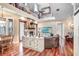 Bright living area with wood floors, fireplace, soaring ceilings, and statement decor at 18929 Crescent Rd, Odessa, FL 33556