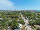 Expansive aerial view of the property, showcasing its location within a lush, green landscape and city skyline at 2026 Cocoanut Ave, Sarasota, FL 34234